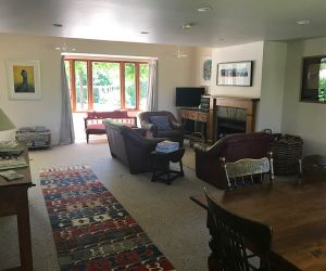 Large sitting room with an open fire