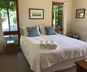 Downstairs bedroom with a king size bed